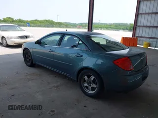 2009 Pontiac G6 1SA with VIN 1G2ZG57B694157985, listed as a IAAI auction lot 42374458 with 202,323 mi miles and . Bid and sale history available at DreamBid. Image 3.