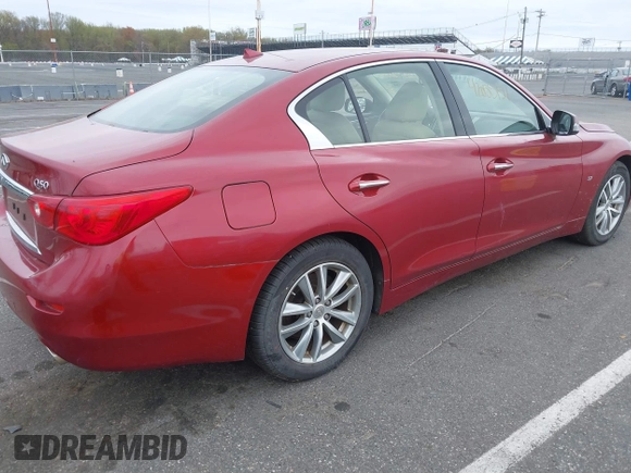 2014 Infiniti Q50 Sport with VIN JN1BV7AR1EM701939, listed as a IAAI auction lot 42051058 with 142,258 mi miles and . Bid and sale history available at DreamBid. Image 4.