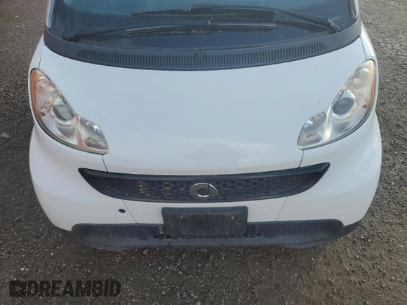2013 Smart fortwo Pure z VIN WMEEJ3BA8DK619967, wystawiony jako Copart lot #49723735 z przebiegiem Nie podano mil oraz Tytuł czysty. Historia ofert i sprzedaży dostępna na DreamBid. Obrazek 11.