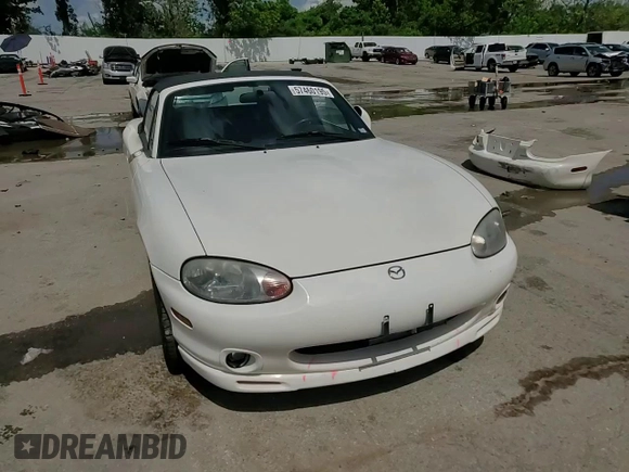 2000 Mazda MX-5 Miata with VIN JM1NB3531Y0152594, listed as a Copart auction lot 57460195 with 78,139 mi miles and Salvage title. Bid and sale history available at DreamBid. Image 14.