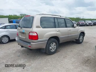 1999 Lexus LX 470 with VIN JT6HT00W6X0041264, listed as a IAAI auction lot 42177546 with 272,000 mi miles and . Bid and sale history available at DreamBid. Image 4.