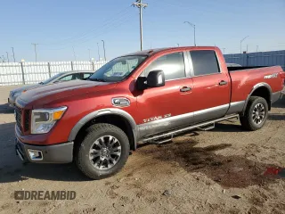 2016 Nissan Titan XD PRO-4X with VIN 1N6BA1F43GN512559, listed as a Copart auction lot 76691104 with 0 mi miles and Salvage Title. Bid and sale history available at carsss.com. Image 1.