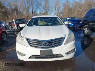 2014 Hyundai Azera with VIN KMHFG4JG6EA354949, listed as a IAAI auction lot 41034372 with 173,338 mi miles and . Bid and sale history available at DreamBid. Image 12.