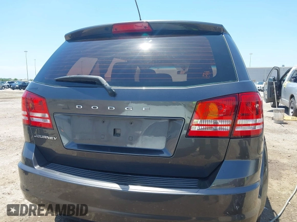 2015 Dodge Journey American Value z VIN 3C4PDCAB2FT637391, wystawiony jako IAAI lot #42354094 z przebiegiem 130 743 mil mil oraz . Historia ofert i sprzedaży dostępna na DreamBid. Obrazek 16.