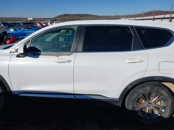 2019 Hyundai Santa Fe SE with VIN 5NMS2CAD2KH020288, listed as a IAAI auction lot 41398304 with 136,693 mi miles and . Bid and sale history available at DreamBid. Image 15.
