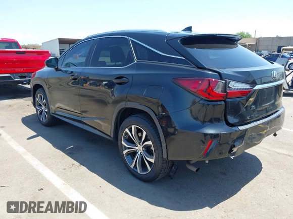 2016 Lexus RX 350 z VIN 2T2ZZMCA2GC031660, wystawiony jako IAAI lot #42460584 z przebiegiem 90 978 mil mil oraz . Historia ofert i sprzedaży dostępna na DreamBid. Obrazek 3.