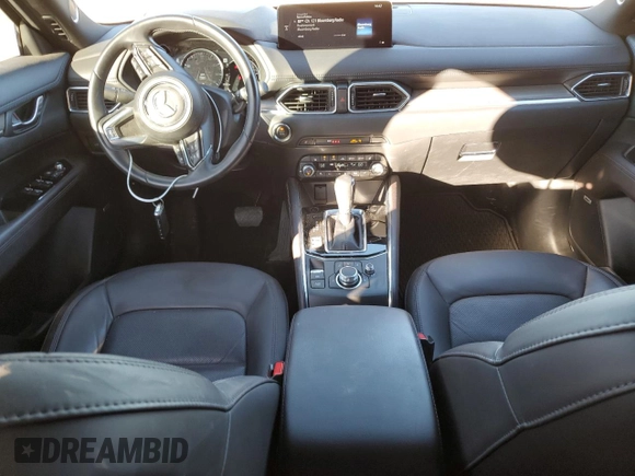2023 Mazda CX-5 Signature with VIN JM3KFBXY1P0122544, listed as a Copart auction lot 83712034 with 27,032 mi miles and Salvage Title. Bid and sale history available at DreamBid. Image 8.