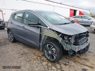 2023 Chevrolet Bolt EV 2LT with VIN 1G1FX6S01P4106409, listed as a IAAI auction lot 41532891 with 24,665 mi miles. Bid and sale history available at carsss.com. Image 1.