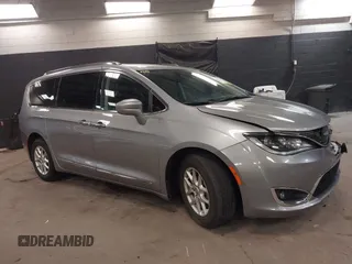 2020 Chrysler Pacifica Touring L z VIN 2C4RC1BG0LR106392, wystawiony jako IAAI lot #42412393 z przebiegiem 57 299 mil mil oraz . Historia ofert i sprzedaży dostępna na DreamBid. Obrazek 1.