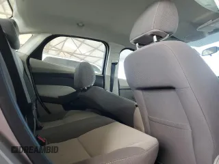 2013 Ford Focus SE z VIN 1FADP3F26DL217215, wystawiony jako Copart lot #46601875 z przebiegiem 167 160 mil mil oraz Szkoda całkowita • Salvage title. Historia ofert i sprzedaży dostępna na DreamBid. Obrazek 10.
