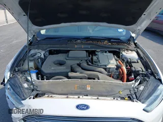 2014 Ford Fusion SE Hybrid with VIN 3FA6P0LUXER233658, listed as a IAAI auction lot 42311588 with 106,282 mi miles and . Bid and sale history available at DreamBid. Image 10.