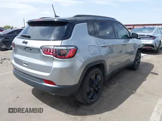 2021 Jeep Compass Altitude with VIN 3C4NJCBB3MT560123, listed as a IAAI auction lot 41914646 with 61,155 mi miles. Bid and sale history available at carsss.com. Image 4.