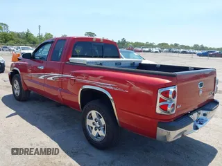 2006 Dodge Dakota SLT with VIN 1D7HE42K96S570558, listed as a IAAI auction lot 42016089 with 144,365 mi miles and . Bid and sale history available at carsss.com. Image 3.