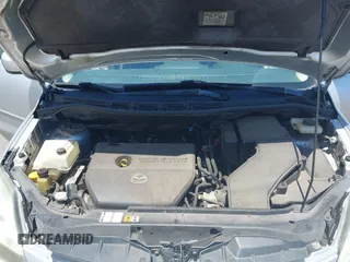 2009 Mazda 5 Sport with VIN JM1CR293990334438, listed as a IAAI auction lot 42561953 with 118,178 mi miles and . Bid and sale history available at DreamBid. Image 10.