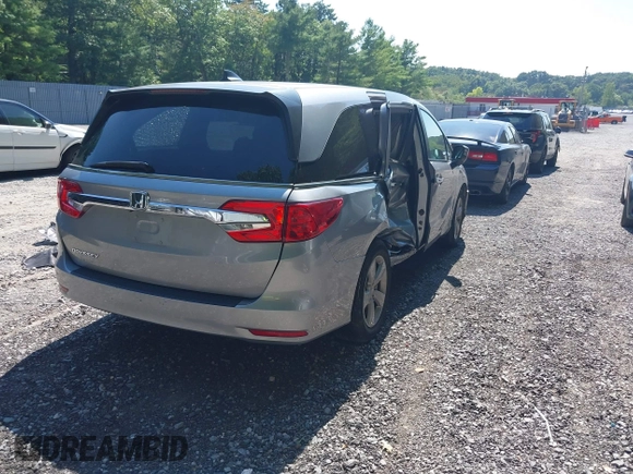 2019 Honda Odyssey EX with VIN 5FNRL6H54KB034206, listed as a IAAI auction lot 40200887 with 63,624 mi miles. Bid and sale history available at carsss.com. Image 4.
