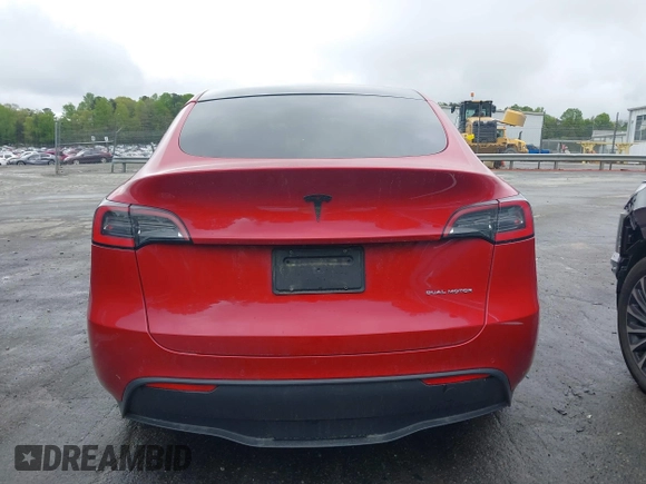 2021 Tesla Model Y Long Range with VIN 5YJYGDEE5MF085032, listed as a IAAI auction lot 41982925 with 64,541 mi miles and . Bid and sale history available at DreamBid. Image 16.