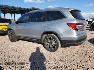 2021 Honda Pilot Touring 8-Passenger with VIN 5FNYF5H97MB001543, listed as a Copart auction lot 42677115 with 40,545 mi miles and Salvage Title. Bid and sale history available at DreamBid. Image 2.