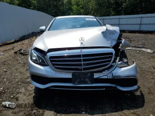 2019 Mercedes-Benz E-Class E 300 with VIN WDDZF4KB8KA532577, listed as a Copart auction lot 63581924 with 111,984 mi miles and Salvage Title. Bid and sale history available at carsss.com. Image 5.