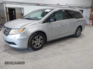 2012 Honda Odyssey EX z VIN 5FNRL5H47CB045705, wystawiony jako IAAI lot #42384430 z przebiegiem 157 598 mil mil oraz . Historia ofert i sprzedaży dostępna na DreamBid. Obrazek 22.