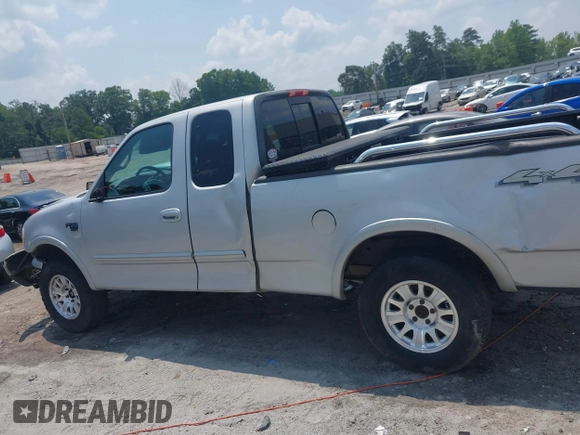 2000 Ford F-150 XL with VIN 1FTRX18L1YNA13975, listed as a IAAI auction lot 42397187 with 235,471 mi miles and . Bid and sale history available at DreamBid. Image 14.
