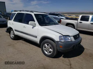 1999 Honda CR-V EX with VIN JHLRD186XXC076864, listed as a Copart auction lot 54567194 with 247,204 mi miles and Salvage Title. Bid and sale history available at carsss.com. Image 4.