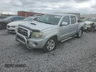 2010 Toyota Tacoma PreRunner with VIN 3TMJU4GN8AM100959, listed as a Copart auction lot 50147425 with 154,669 mi miles and Salvage Title. Bid and sale history available at DreamBid. Image 1.