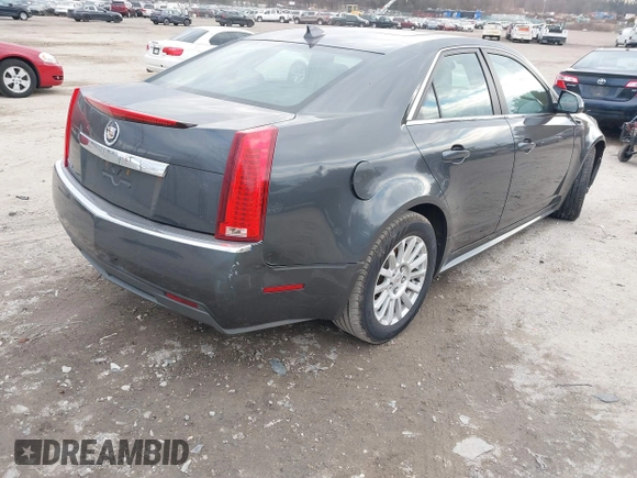 2012 Cadillac CTS Luxury z VIN 1G6DE5E51C0112608, wystawiony jako IAAI lot #41656992 z przebiegiem Nie podano mil oraz . Historia ofert i sprzedaży dostępna na DreamBid. Obrazek 4.