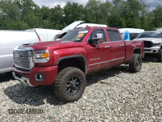 2019 GMC Sierra 3500HD Denali z VIN 1GT42WEY5KF258110, wystawiony jako Copart lot #65333944 z przebiegiem Nie podano mil oraz Szkody całkowita. Historia ofert i sprzedaży dostępna na DreamBid. Obrazek 1.