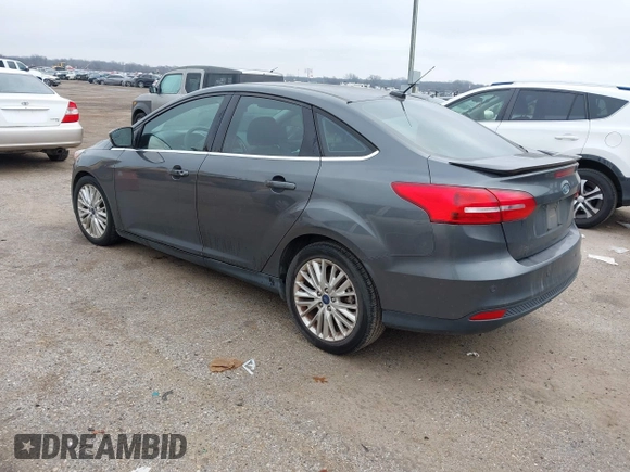 2018 Ford Focus Titanium with VIN 1FADP3J29JL232911, listed as a IAAI auction lot 41524078 with 90,764 mi miles and . Bid and sale history available at DreamBid. Image 3.