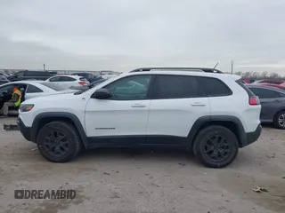 2019 Jeep Cherokee Trailhawk with VIN 1C4PJMBN6KD124023, listed as a IAAI auction lot 41432217 with 76,934 mi miles and . Bid and sale history available at DreamBid. Image 15.