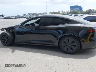2023 Tesla Model S with VIN 5YJSA1E52PF528795, listed as a IAAI auction lot 42110660 with 21,243 mi miles and . Bid and sale history available at DreamBid. Image 14.
