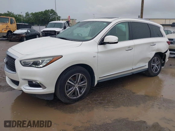 2019 Infiniti QX60 Pure with VIN 5N1DL0MN6KC501941, listed as a IAAI auction lot 42384227 with 103,470 mi miles and . Bid and sale history available at DreamBid. Image 2.