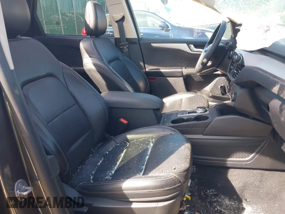 2020 Ford Escape SE Sport Hybrid with VIN 1FMCU9BZ0LUB81689, listed as a IAAI auction lot 41978638 with 69,831 mi miles and . Bid and sale history available at DreamBid. Image 5.