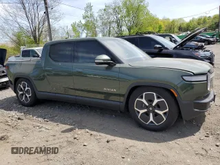 2024 Rivian R1T Adventure z VIN 7FCTGCAA1RN030829, wystawiony jako Copart lot #55557565 z przebiegiem Nie podano mil oraz Szkody całkowita. Historia ofert i sprzedaży dostępna na DreamBid. Obrazek 4.