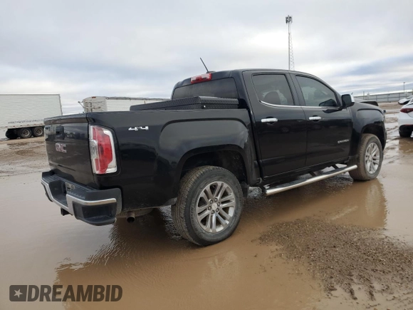 2015 GMC Canyon 4WD SLT with VIN 1GTG6CE38F1262174, listed as a Copart auction lot 80066724 with 154,267 mi miles and Salvage Title. Bid and sale history available at carsss.com. Image 3.