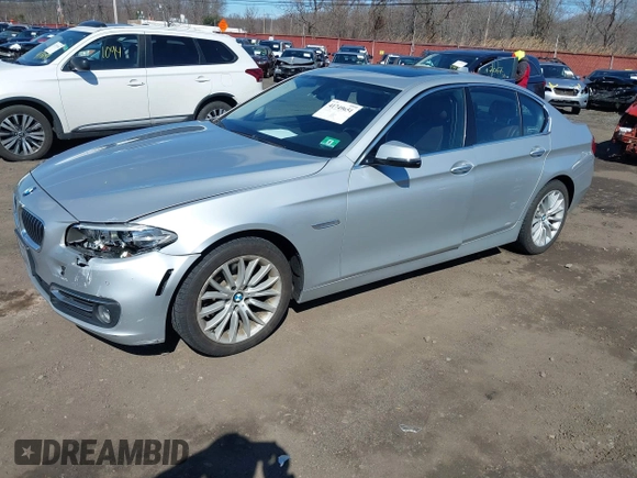 2014 BMW 5 Series 528i xDrive with VIN WBA5A7C58ED617131, listed as a IAAI auction lot 41749651 with 117,954 mi miles and . Bid and sale history available at DreamBid. Image 2.