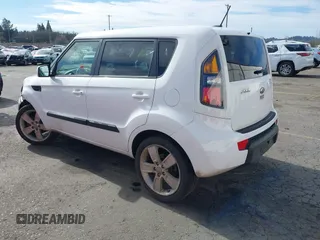2011 Kia Soul + with VIN KNDJT2A23B7267442, listed as a IAAI auction lot 41671119 with 123,577 mi miles. Bid and sale history available at carsss.com. Image 3.