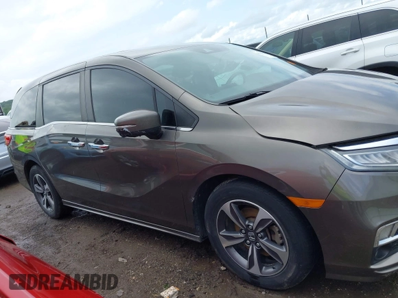 2019 Honda Odyssey Touring with VIN 5FNRL6H81KB038790, listed as a IAAI auction lot 42200190 with 131,761 mi miles and . Bid and sale history available at DreamBid. Image 14.