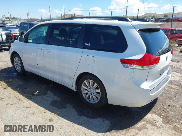 2011 Toyota Sienna XLE with VIN 5TDDK3DCXBS029961, listed as a IAAI auction lot 42228356 with 251,571 mi miles and . Bid and sale history available at DreamBid. Image 3.