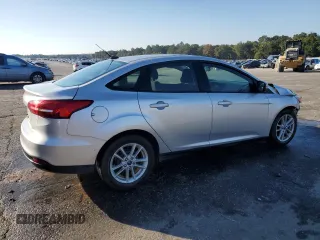 2017 Ford Focus SE with VIN 1FADP3F28HL315779, listed as a Copart auction lot 82608154 with 143,902 mi miles and Salvage title. Bid and sale history available at DreamBid. Image 3.