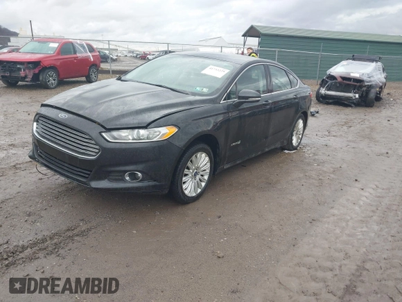 2015 Ford Fusion SE Hybrid with VIN 3FA6P0LU1FR289246, listed as a IAAI auction lot 41733229 with 125,195 mi miles. Bid and sale history available at carsss.com. Image 2.