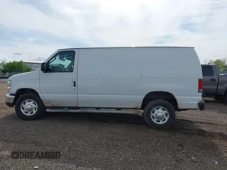 2011 Ford Econoline Cargo Commercial z VIN 1FTNE2EW0BDA56676, wystawiony jako IAAI lot #42215010 z przebiegiem 179 752 mil mil oraz . Historia ofert i sprzedaży dostępna na DreamBid. Obrazek 13.
