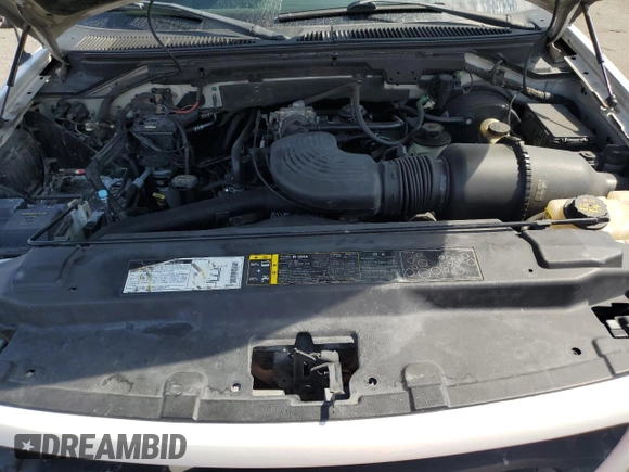 2002 Ford F-150 XL z VIN 1FTRX18L42NB40419, wystawiony jako Copart lot #60486205 z przebiegiem 241 853 mil mil oraz Szkoda całkowita • Salvage title. Historia ofert i sprzedaży dostępna na DreamBid. Obrazek 11.