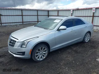 2017 Cadillac ATS Sedan AWD with VIN 1G6AG5RX4H0176223, listed as a IAAI auction lot 41980295 with 105,860 mi miles. Bid and sale history available at carsss.com. Image 2.
