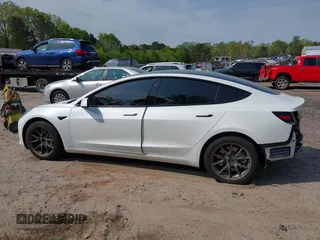 2021 Tesla Model 3 Standard Range Plus z VIN 5YJ3E1EA9MF027985, wystawiony jako IAAI lot #42045254 z przebiegiem 42 353 mil mil oraz . Historia ofert i sprzedaży dostępna na DreamBid. Obrazek 14.