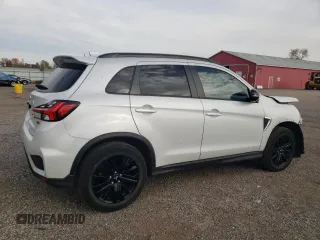 2022 Mitsubishi Outlander Sport SE z VIN JA4AJVAW2NU606282, wystawiony jako Copart lot #73378103 z przebiegiem 21 230 mil mil oraz . Historia ofert i sprzedaży dostępna na DreamBid. Obrazek 3.