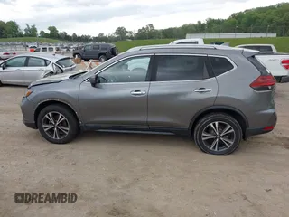 2019 Nissan Rogue SL with VIN 5N1AT2MVXKC842256, listed as a IAAI auction lot 42075237 with 100,377 mi miles and . Bid and sale history available at carsss.com. Image 14.