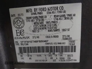 2011 Ford F-150 XLT with VIN 1FTFW1ET4BFB50467, listed as a IAAI auction lot 41608114 with 201,858 mi miles. Bid and sale history available at carsss.com. Image 9.