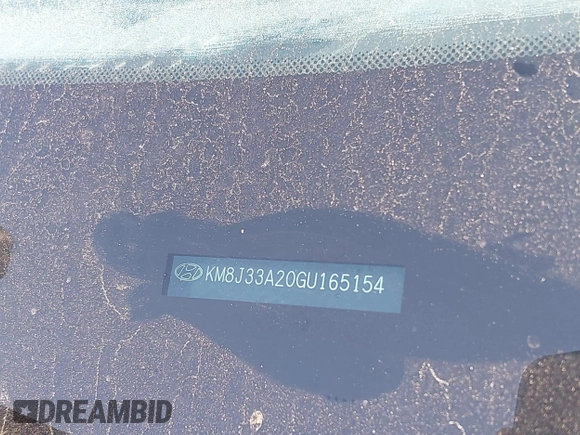 2016 Hyundai Tucson Sport with VIN KM8J33A20GU165154, listed as a IAAI auction lot 41611785 with Not Provided miles. Bid and sale history available at carsss.com. Image 9.