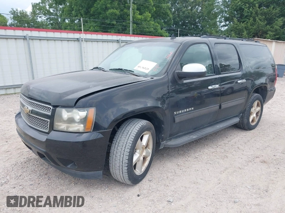 2011 Chevrolet Suburban LT with VIN 1GNSCJE07BR128885, listed as a IAAI auction lot 42456748 with 201,789 mi miles and . Bid and sale history available at DreamBid. Image 17.